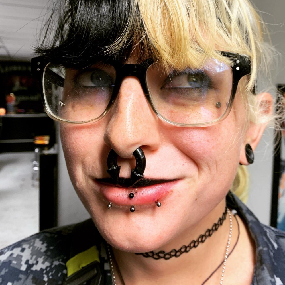 Snake Bites (lip) at Calico Creek Tattoo Co. in Wichita, KS