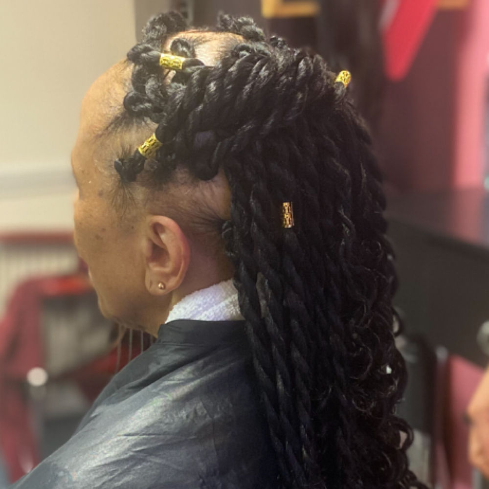 Passion Twist With Added Hair at Koi Beauty Esthetics in Fayetteville, NC