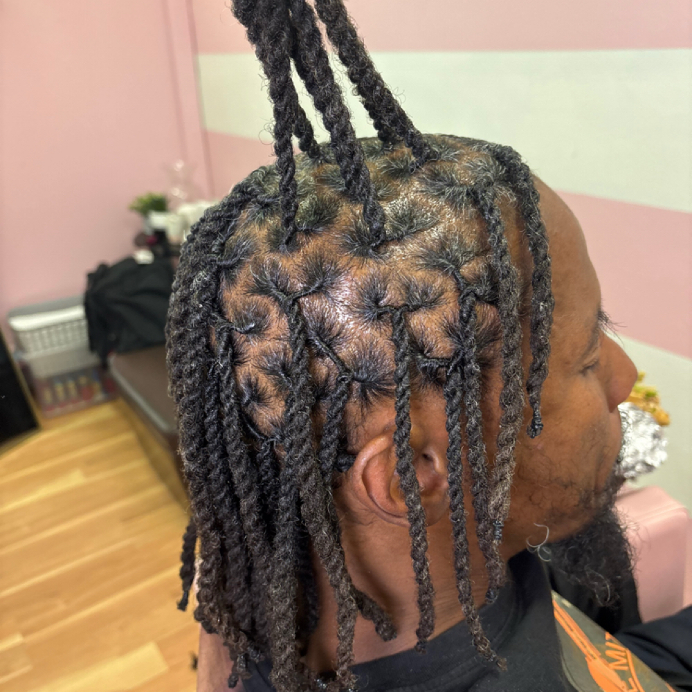 Loc Retwist at Crowned Beauty Studios LLC in Detroit, MI
