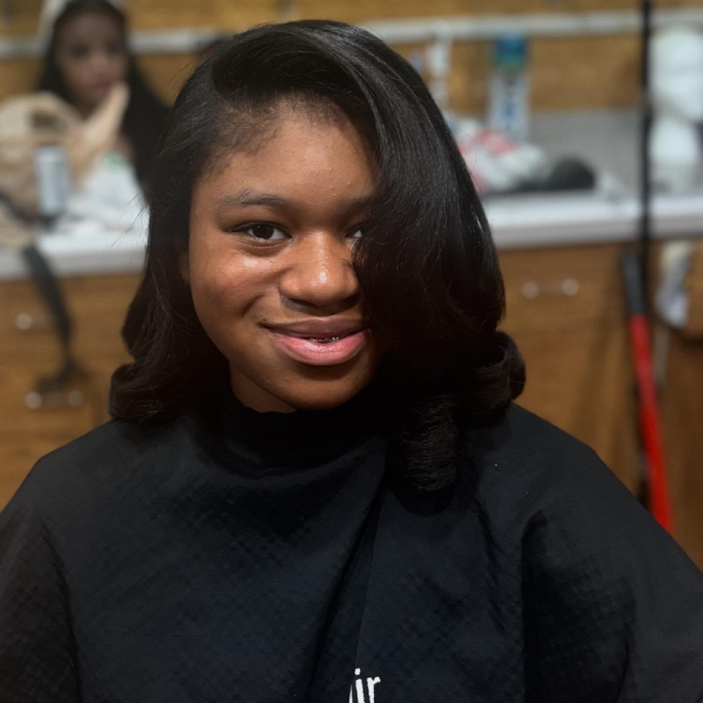 Deluxe Silk press at Artistry of Braiding in Milwaukee, WI