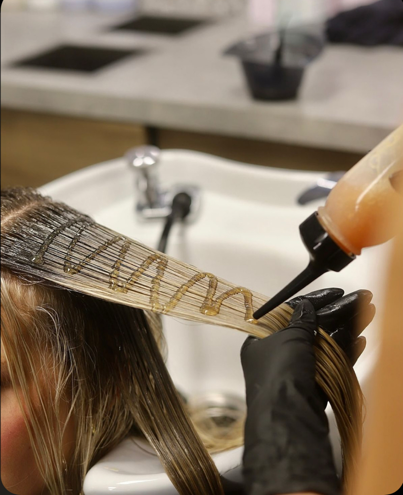 Gloss at The Artist’s Cupboard hair salon in New Caney, TX