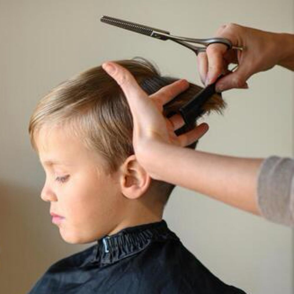 Kids Haircut 12 & under at Beachy Blowout Bar & Salon LLC in Gulf Shores, AL