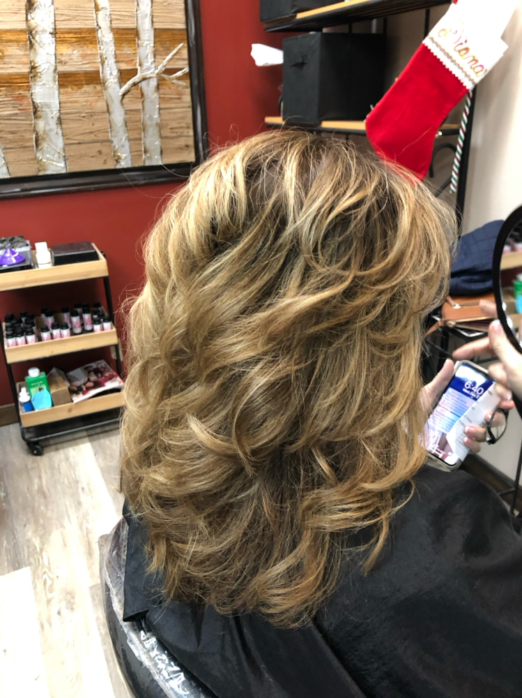 Blow Out Long Hair at Strands Hair Company in Viera, FL