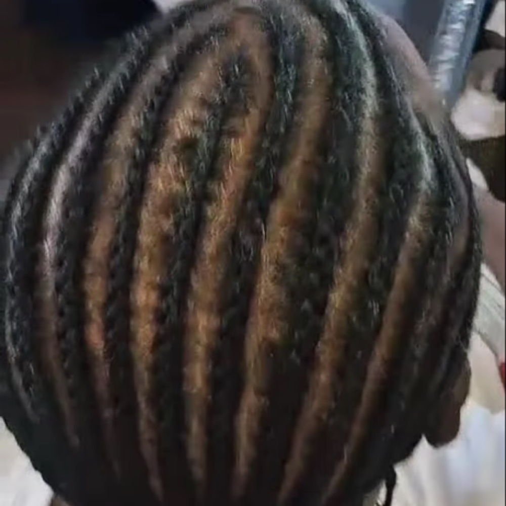 Men Feedins at Bebe African Hair Braiding LLC in Milwaukee, WI
