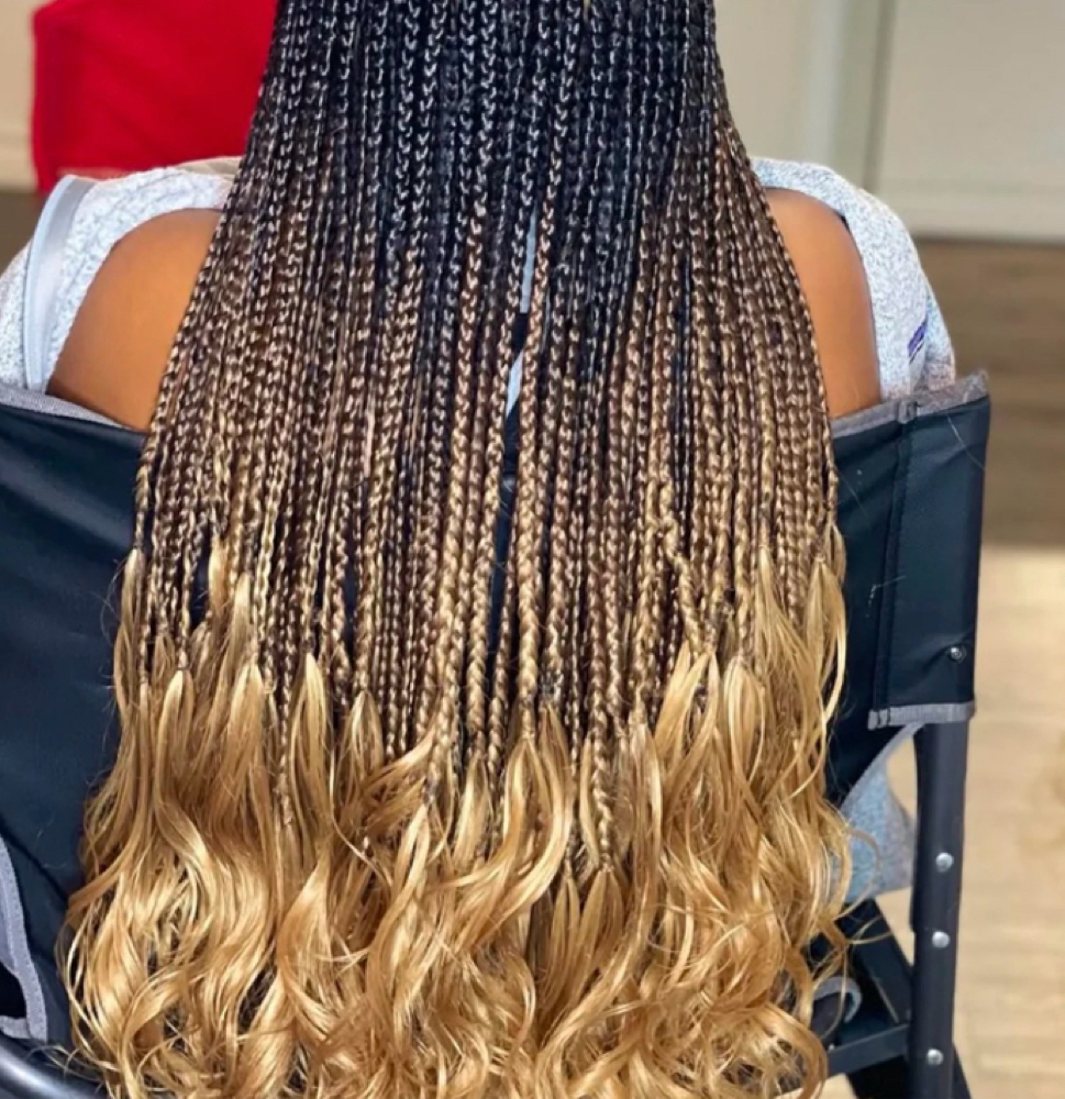 Knotless French Curl Braids at Angel's Hair Salon in Kansas City, MO