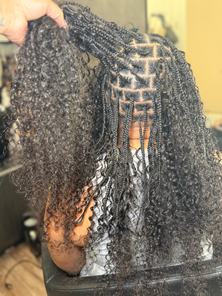 S’medium Knotless Box Braids at Vain Galore Salon & Spa in Austell, GA
