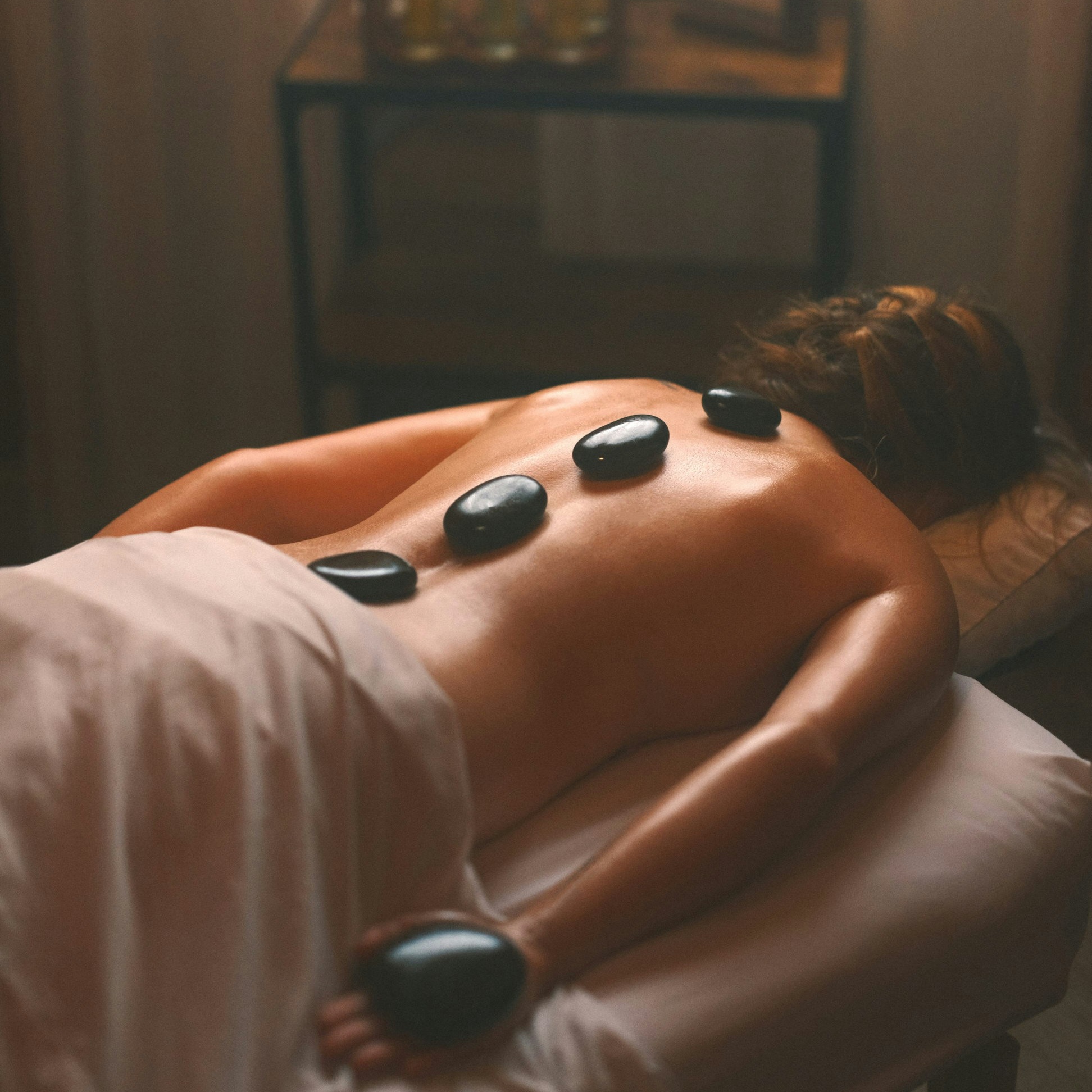 Hot Stone + Massage at Massage by Ashley in Jeffersonville, IN