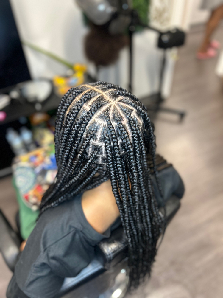 Medium Knotless Braids at Ayo Locs N Braids in Charlotte, NC
