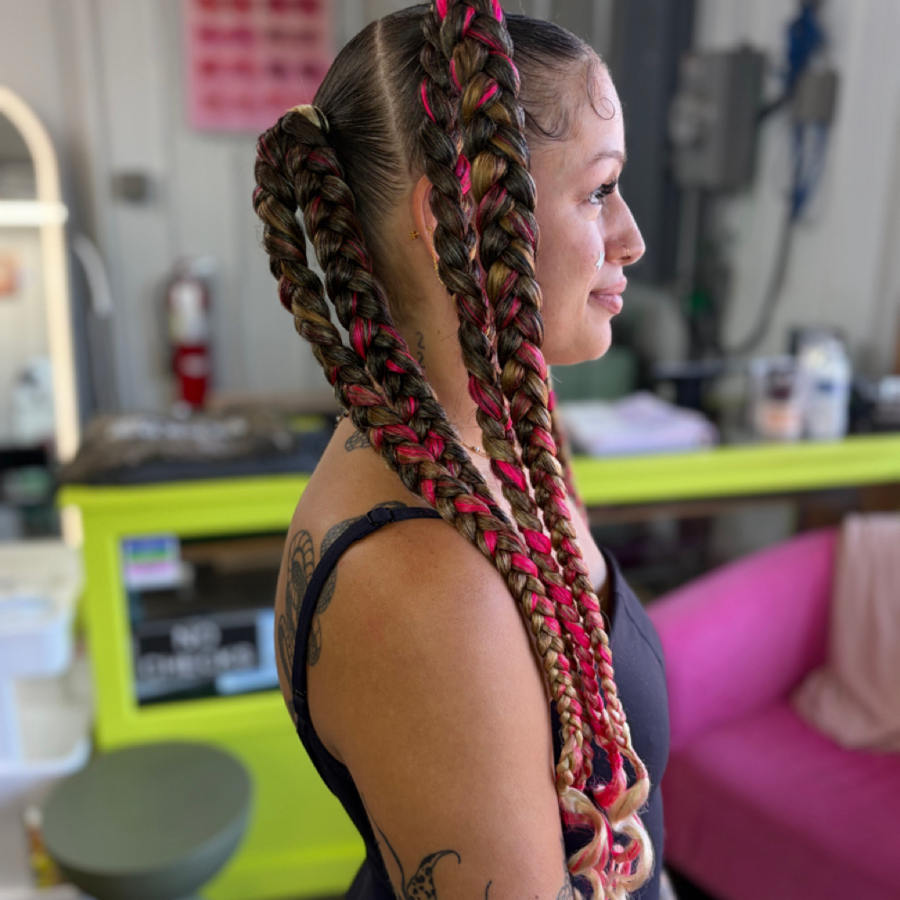 Braided Ponytails at Simply Snatched in Nevada, MO