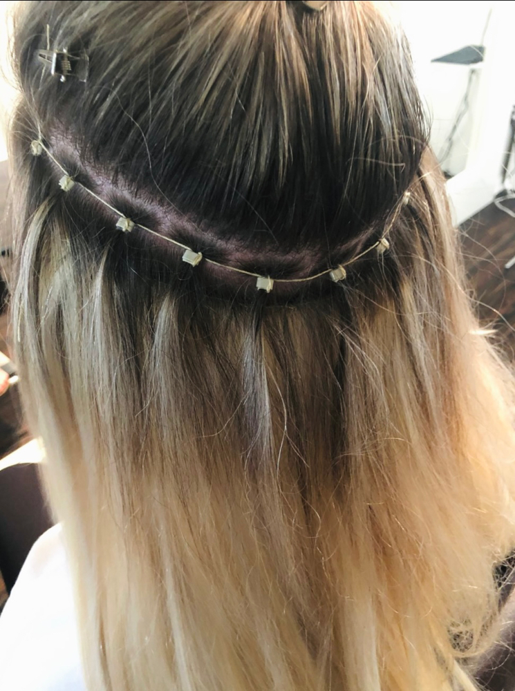 Sewn-In Handtied Extensions