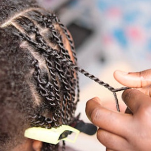 Loc retwist at Blossoms HTX Hair Studio in Spring, TX