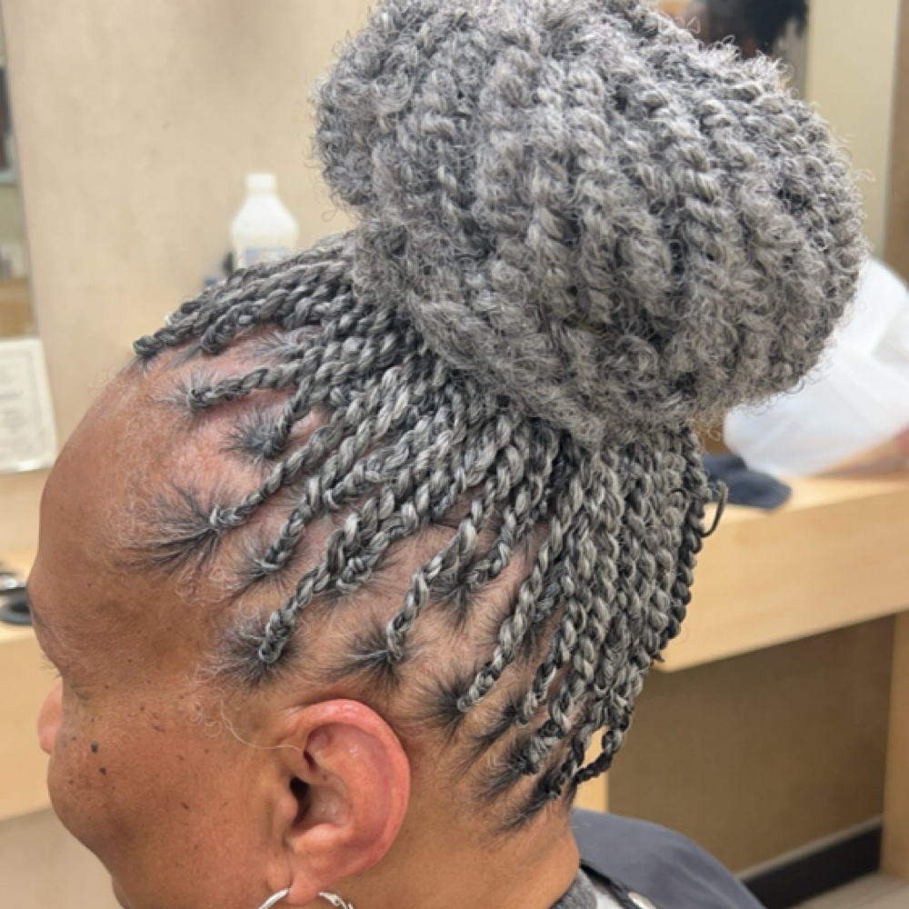 Loc retwist at Blossoms HTX Hair Studio in Spring, TX