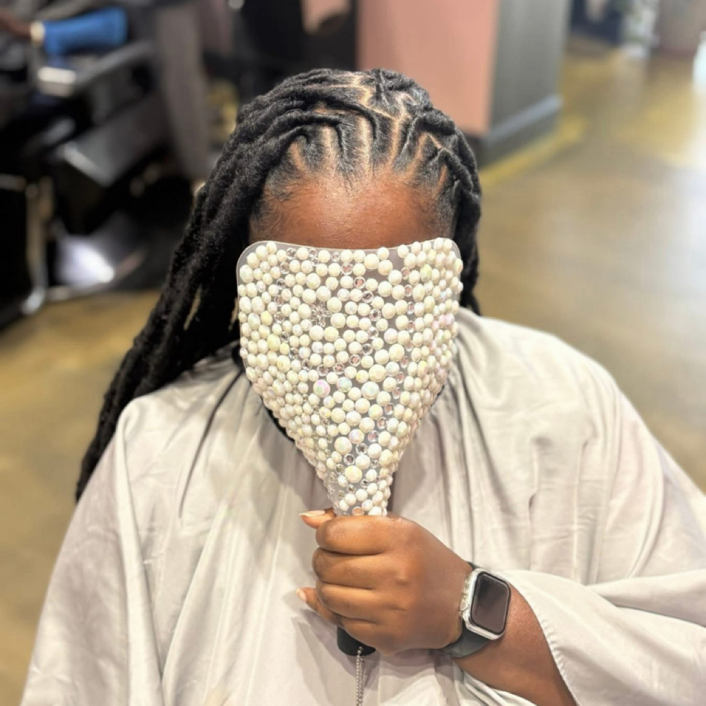 Traditional Loc Retwist at Moriah’s Beauty Bar in Fayetteville, NC