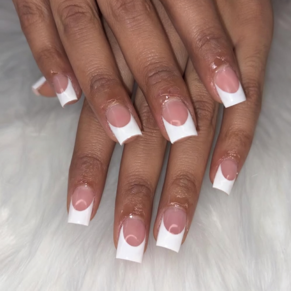 French tips on extensions at Starr Struck Nails LLC in Denver, CO