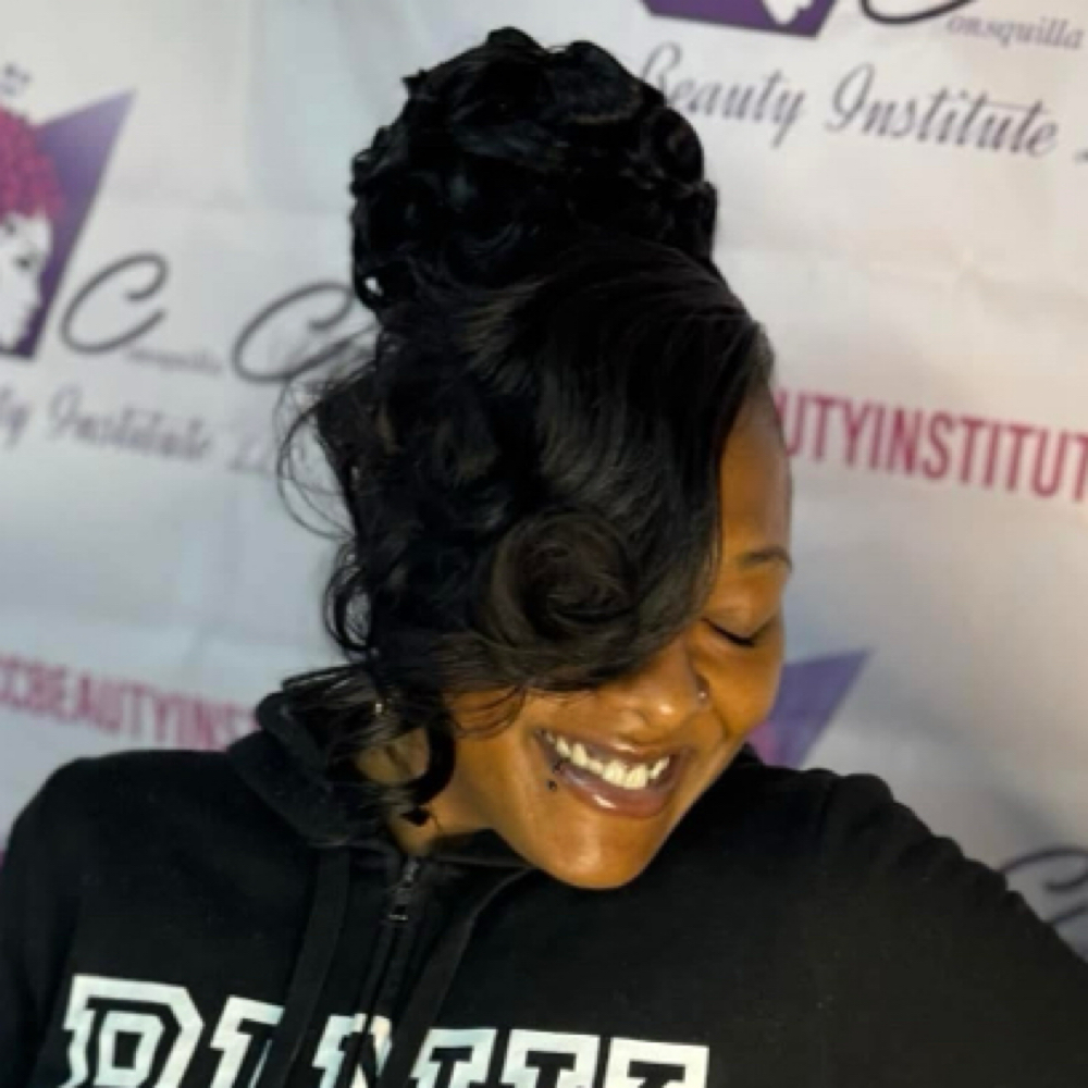 Updo with hair added at Consquilla  Carey in Richmond, VA