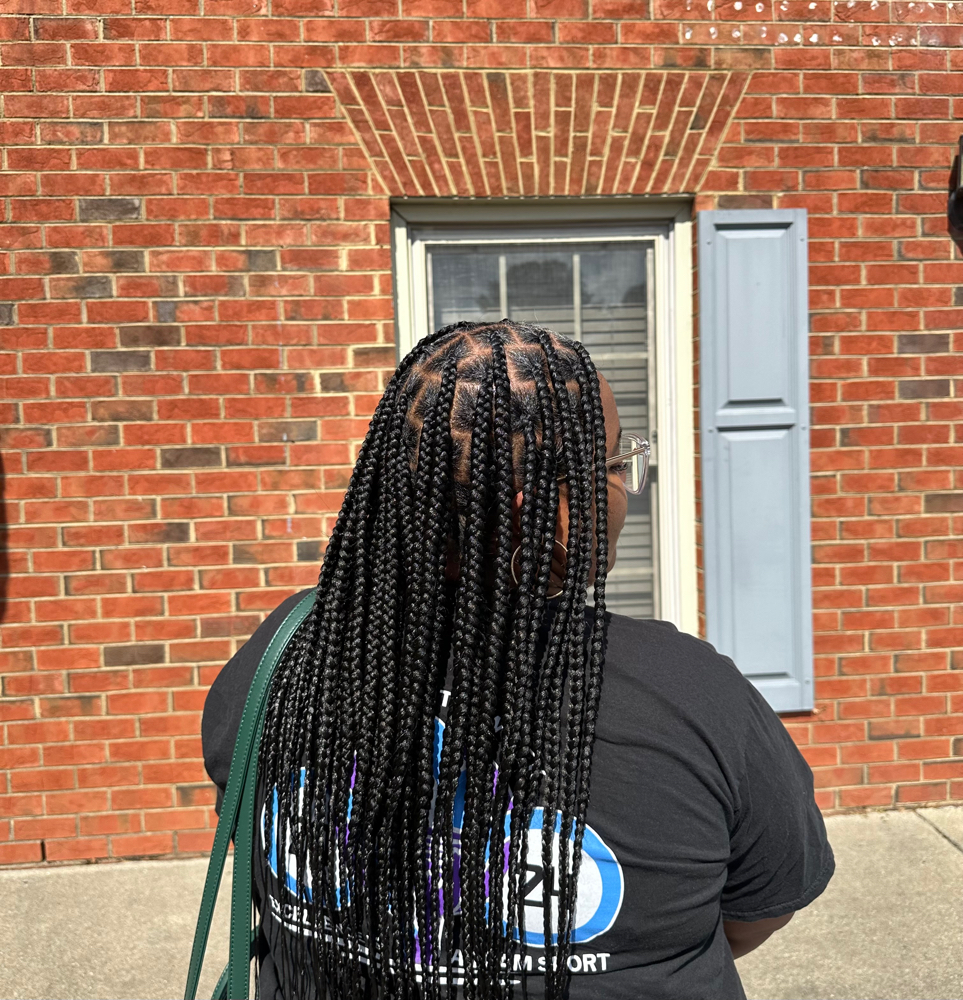 Knotless Braids at Règne Royale in Greenville, NC