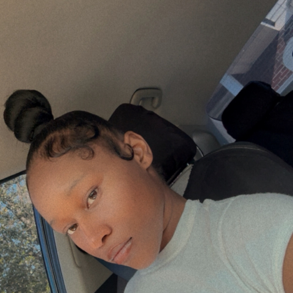 Top Knot Bun at Laid by Lannec’ in Claxton, GA