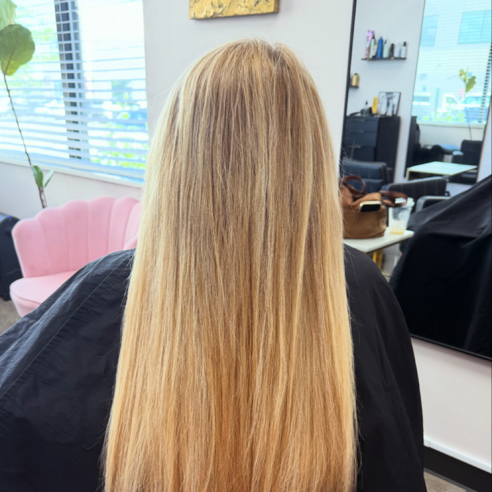 Natural highlights application at LUXE Rosé Hair Extensions | Hair by Moriah in Castle Rock, CO
