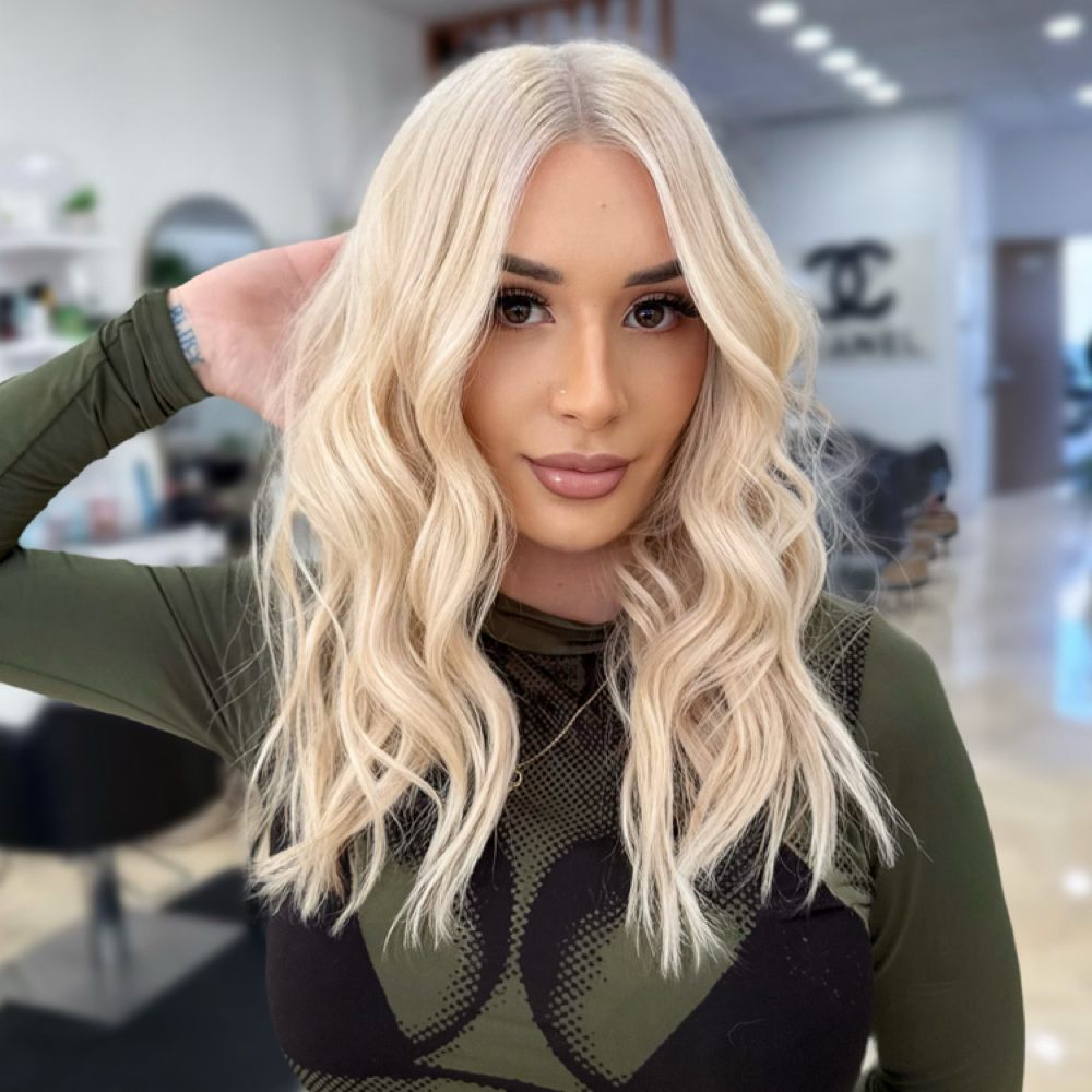 Bleach And Tone Retouch at Único Hair Studio in Fullerton, CA