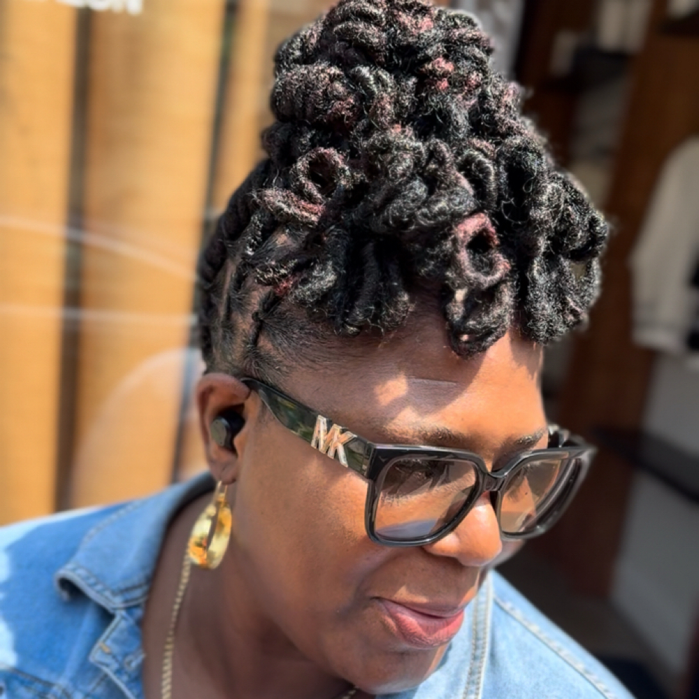 Lock re-twist with a style at Lord Make Me Over Salon in Wilmington,, DE