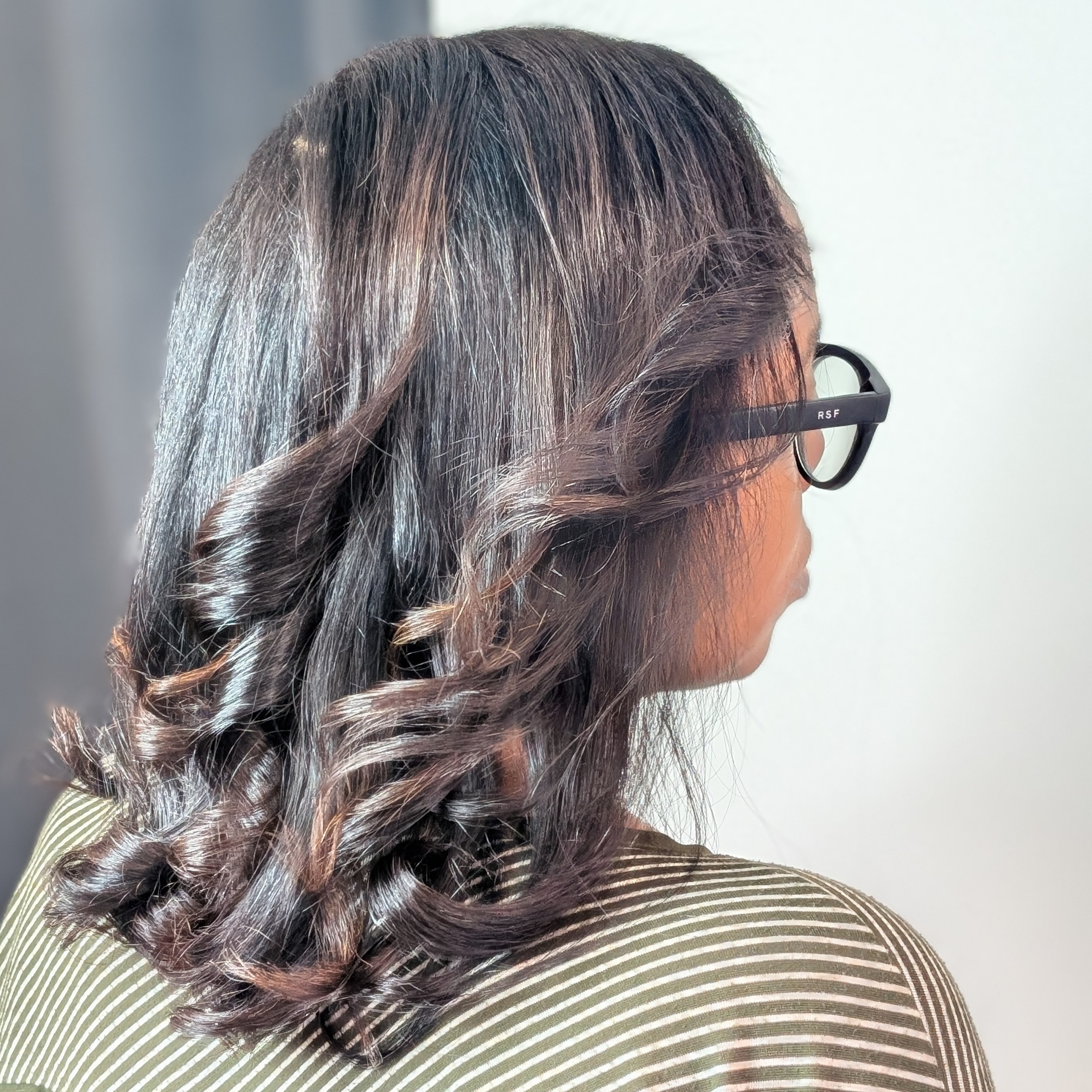 Signature Silk Press Package at Dimensions Hair Studio & Spa in East Patchogue, NY