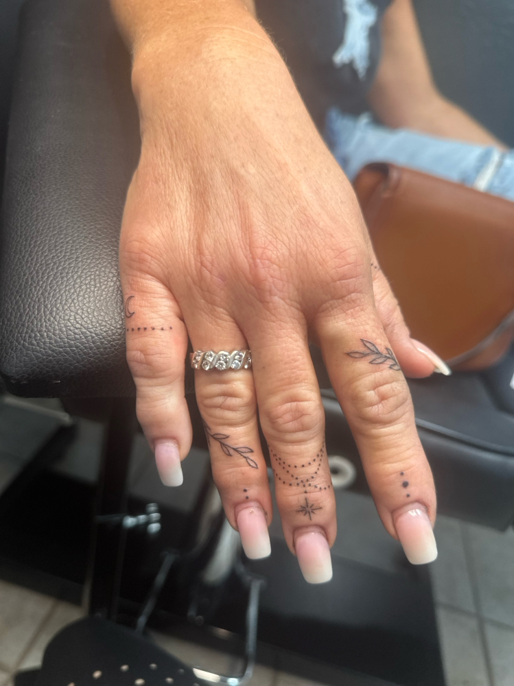 Finger/Hand Tattoos at Jens Ink Tattoo Studio in Sebring, FL