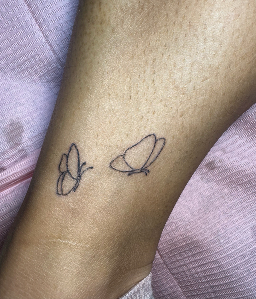 Two small tattoos (one person)