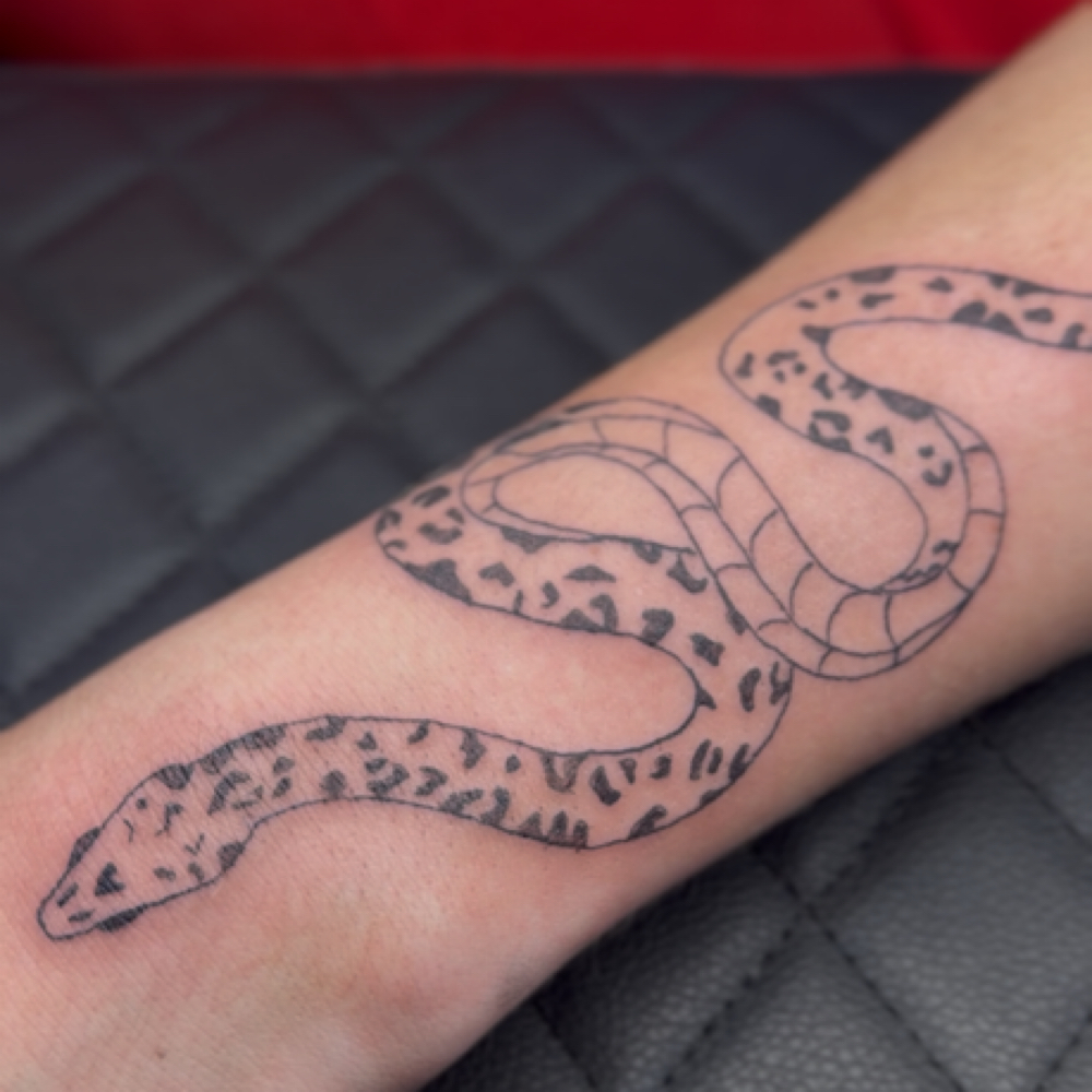 Large Fine Line Tattoo at Ink Addict Tattoos in The Woodlands, TX