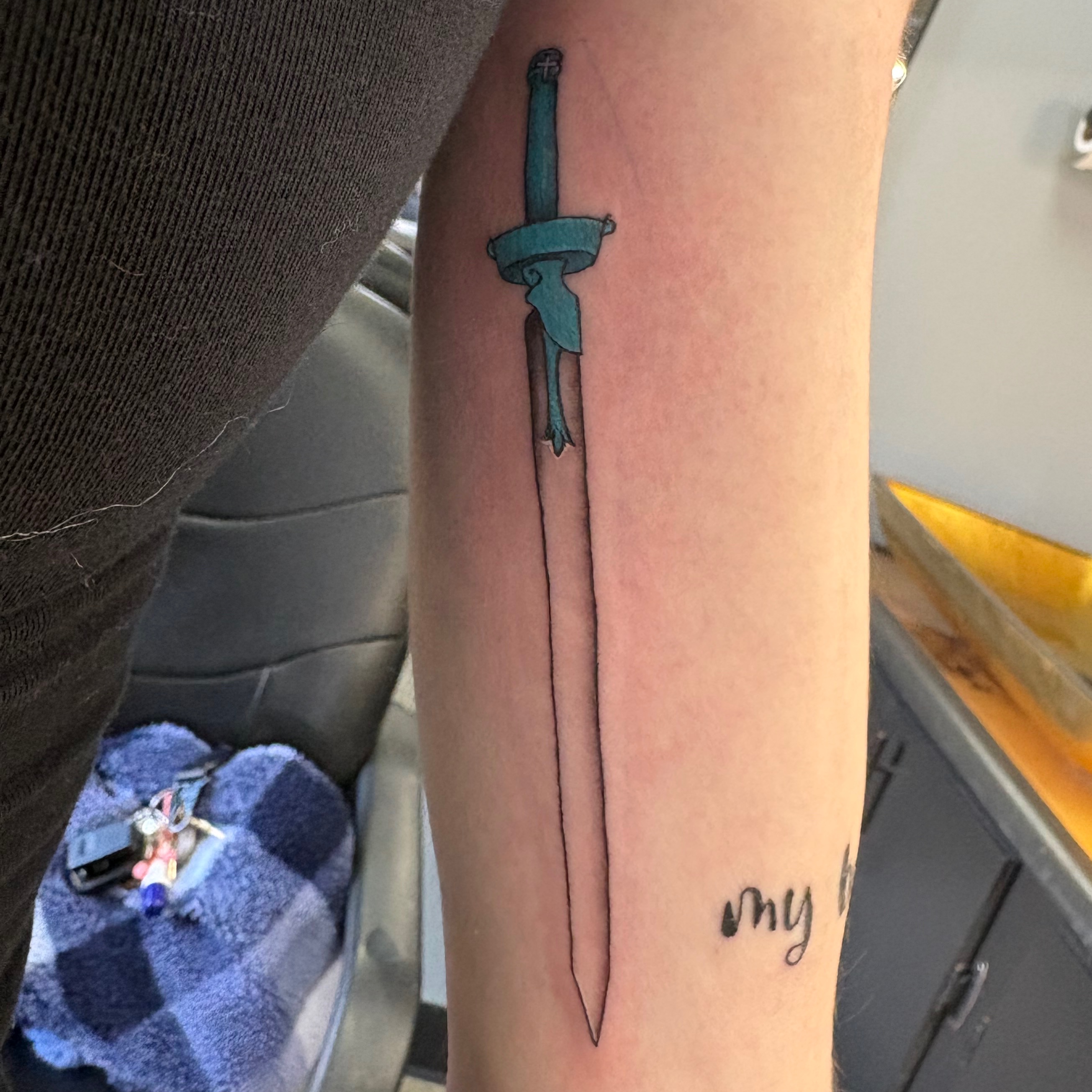 “Small-Medium” Tattoo at Golden Tattoo & Piercing in Iowa City, IA