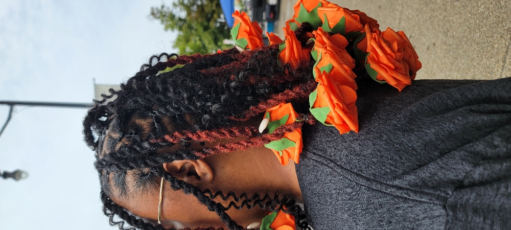 Styles With Extra Hair at Natural Identity in Buffalo, NY