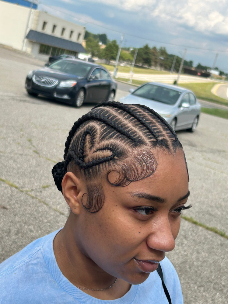 6 Stitch Braids With A Design at The Hairapist Experience in Mount morris, MI