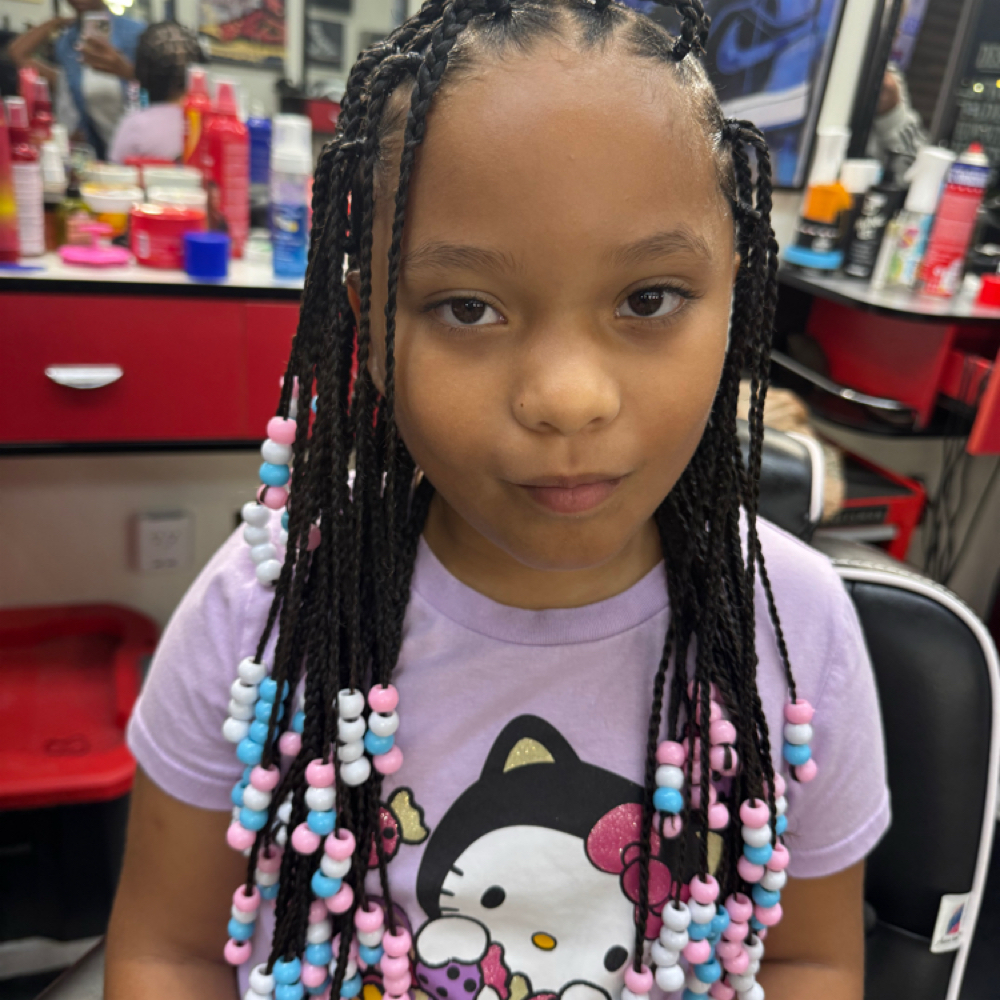 KUDI Kids Natural Hair Braids at Man Cave Retreat Barbershop in Fort Myers, FL