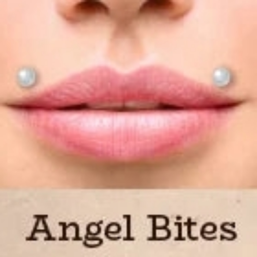 Angel Bites/fangs at Piercings By Autumn in New Castle, PA
