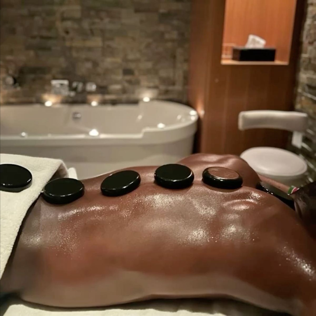 Hot Stone Therapy (Add-On) at Moor Than Wellness in Philadelphia, PA