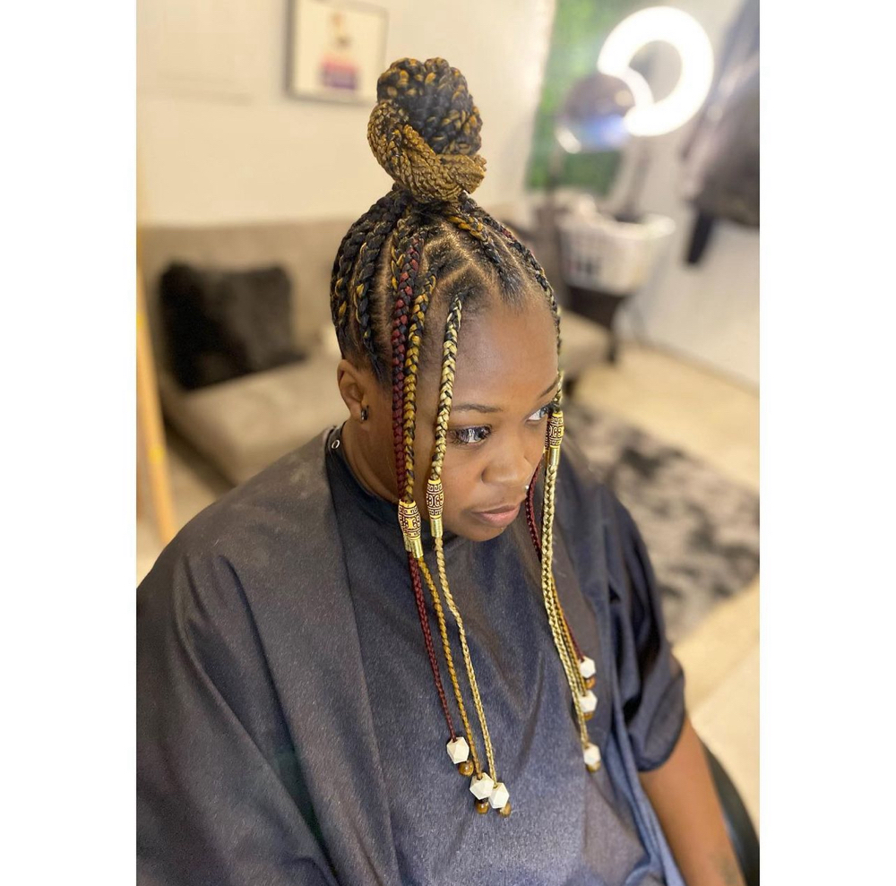 Feeding Cornrow Bun w/ Indvidials