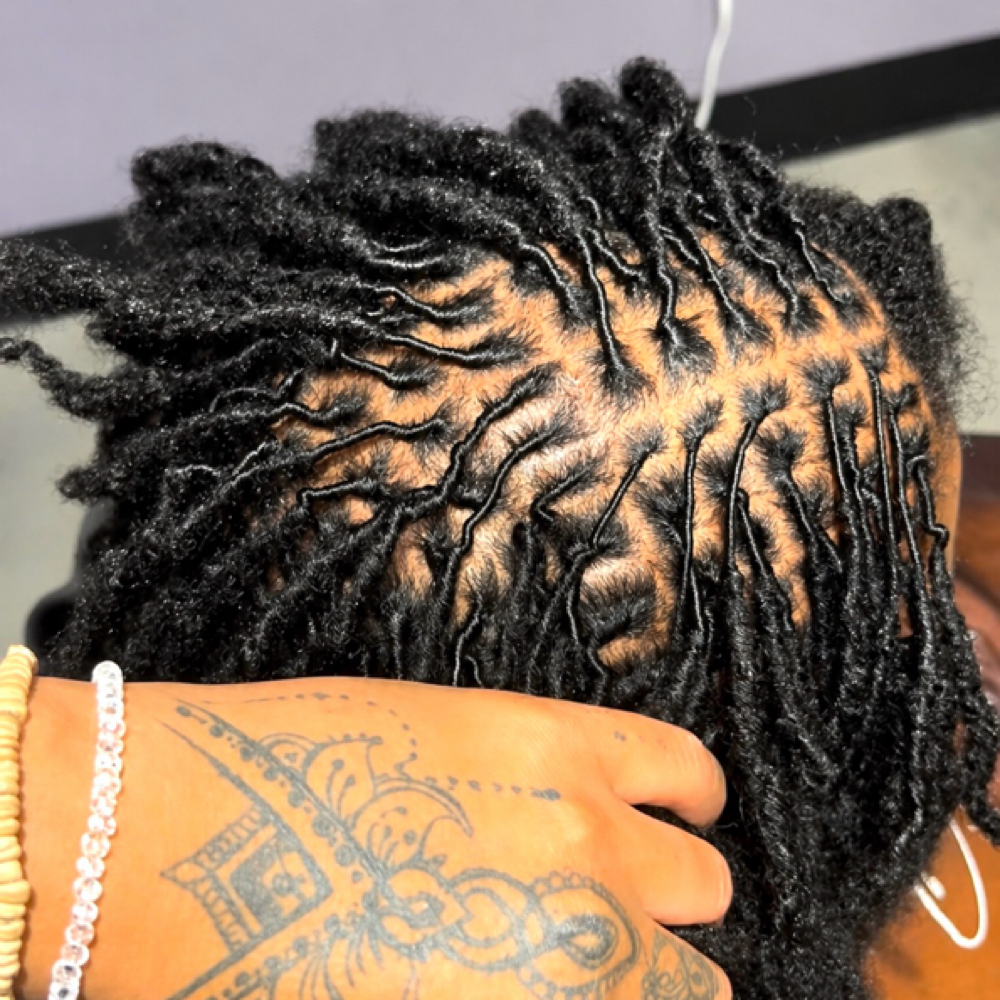 Loc retwist at Freedom Bound Studio in Raleigh, NC
