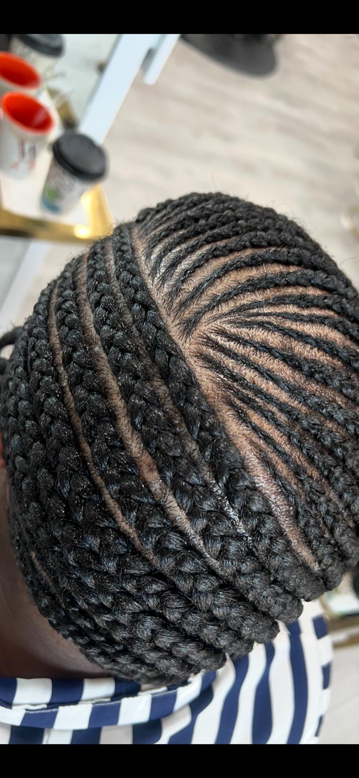 Cornrows feeding at Beauty By Mombo in Austin, TX