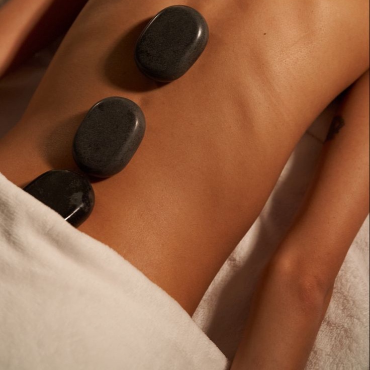 Hot Stone Massage - 90 Minutes at TheSkinAddikt in Chattahoochee Hills, GA