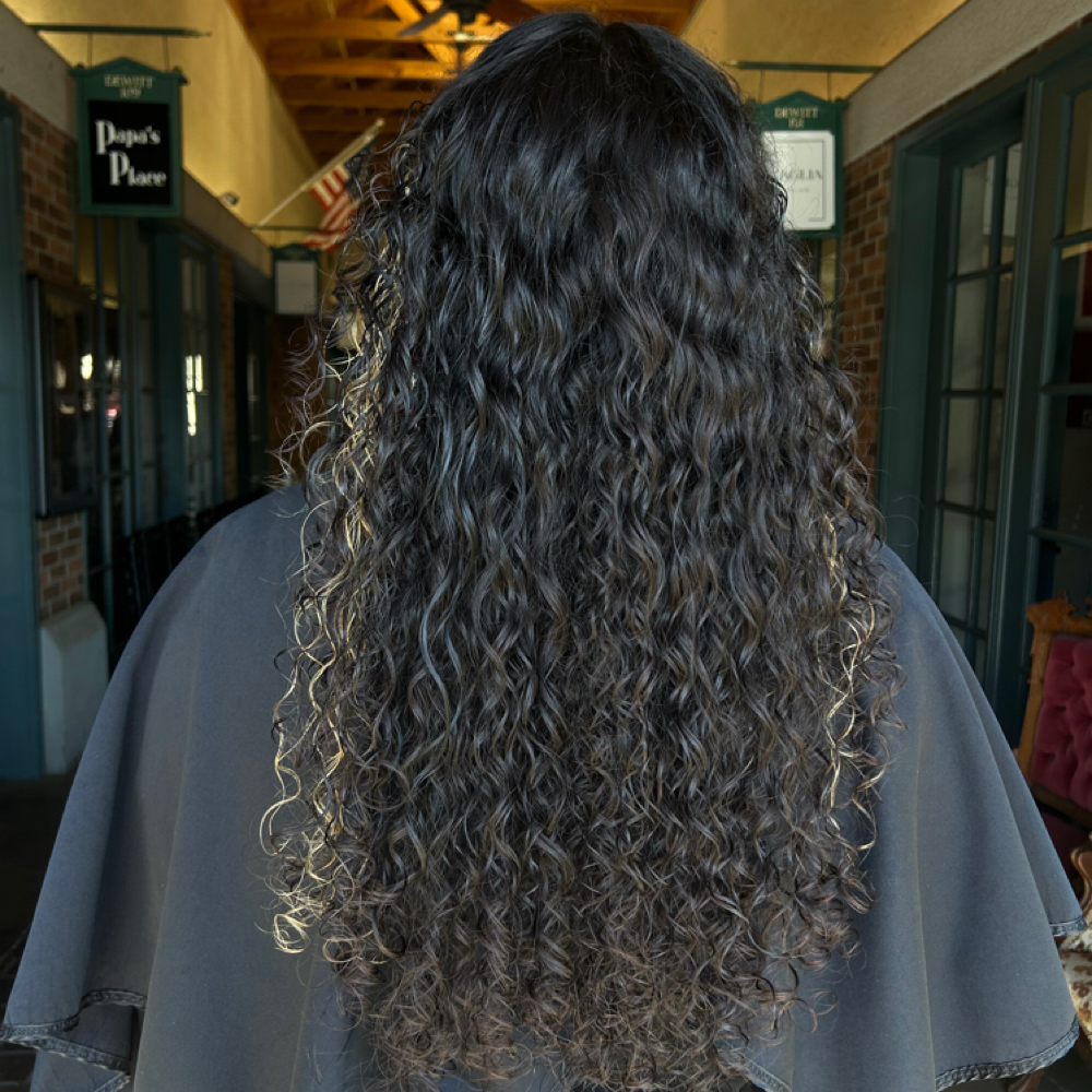 Curly Layered Cut at Hair by Alex Hernandez in Clovis, CA