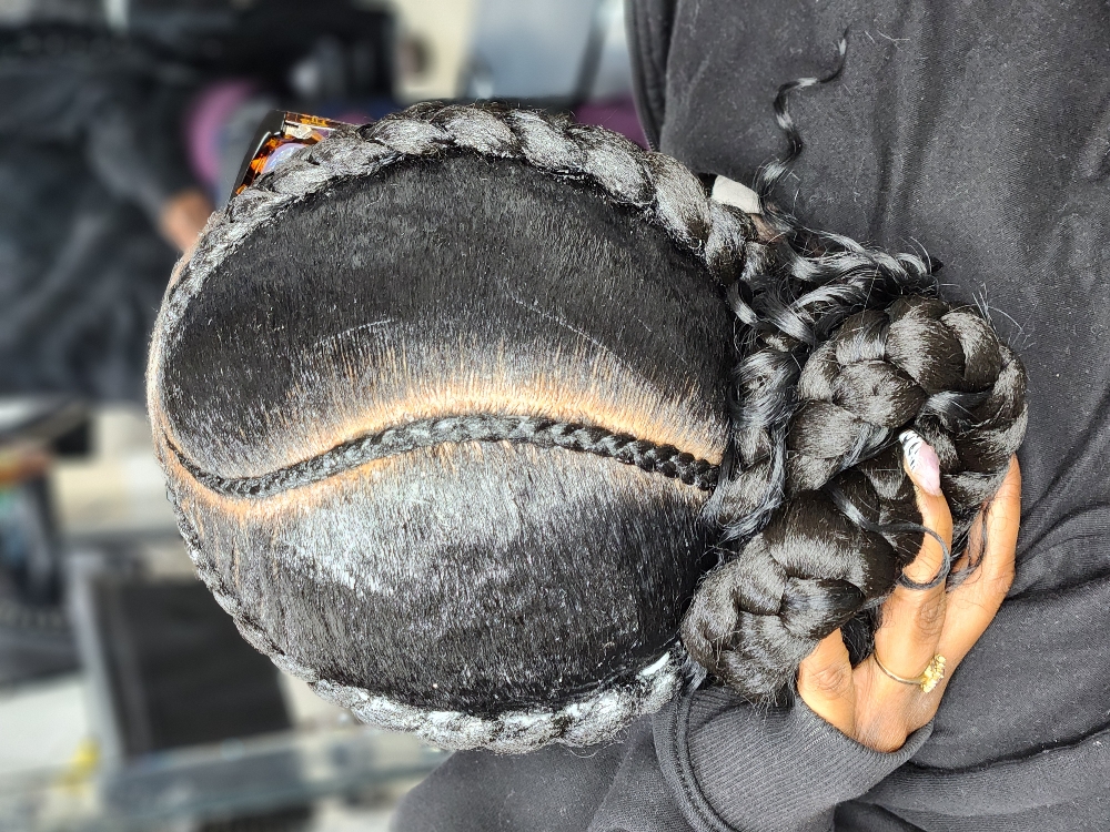 Two Cornrows at MaryamuAfricanbraids in Newark, NJ