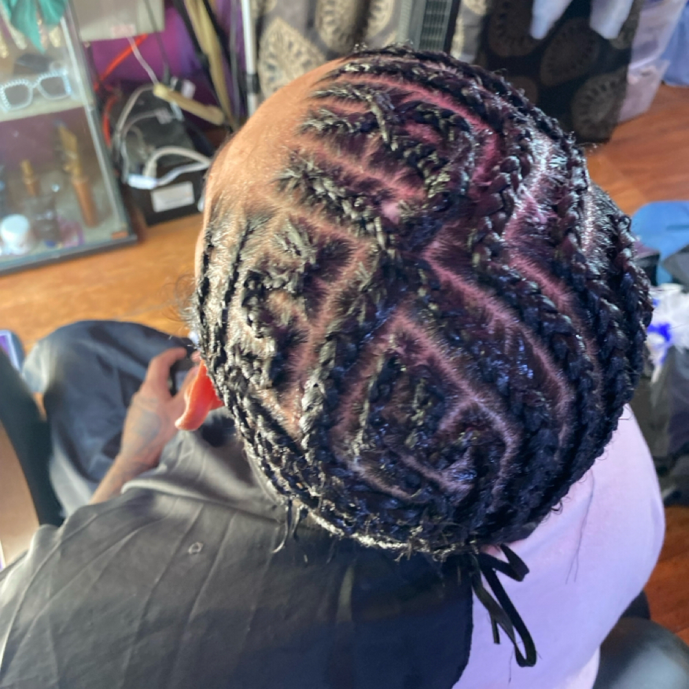 Male Cornrow Styles (Top) at Kay’s Touch of Klass Hair & Beauty Studio in Converse, TX