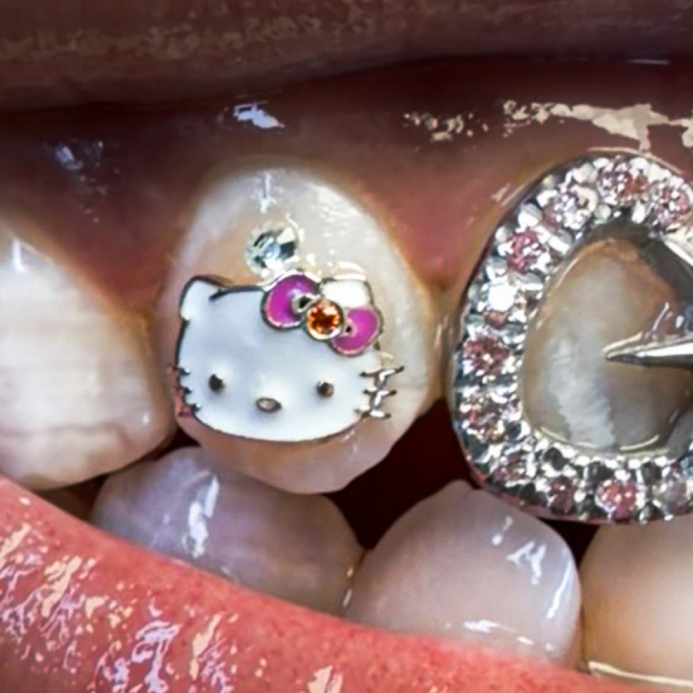 18kt Gold Hello Kitty Enamel Gem at PsychoTeeth in manhattan, NY