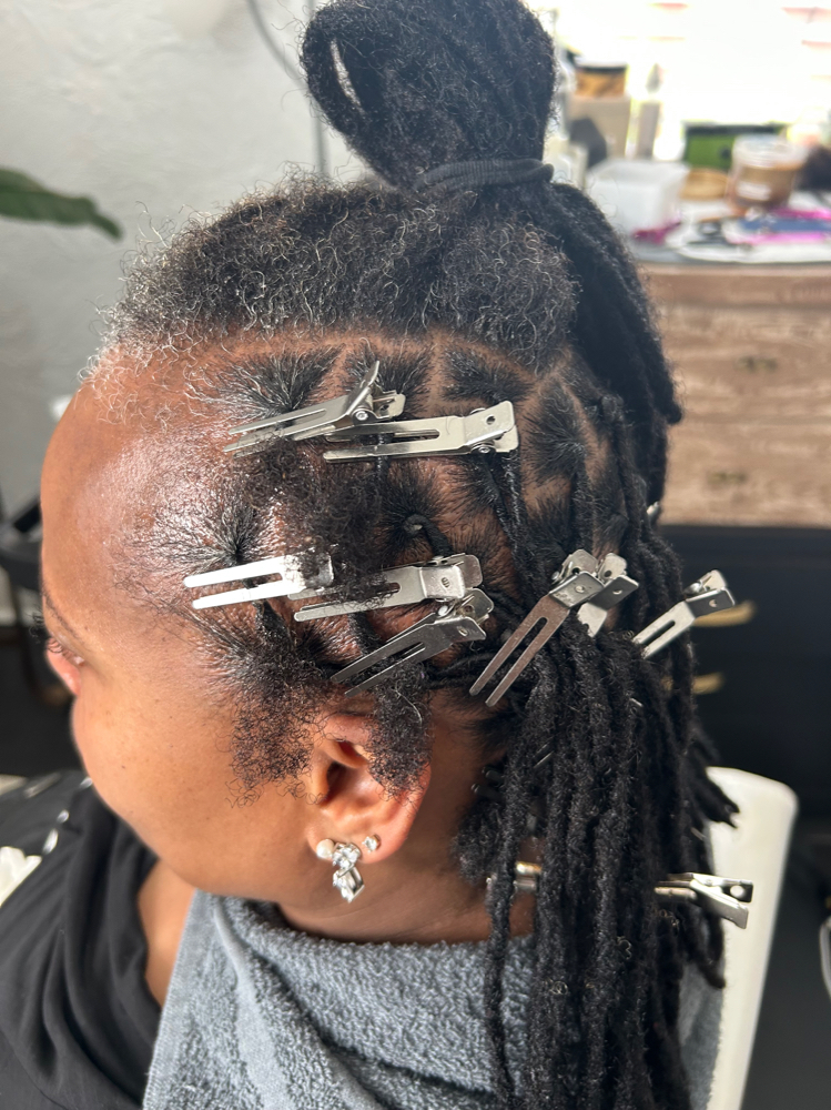 Reattaching Locs at 473 Locs Natural hair Studio in Evansville, IN