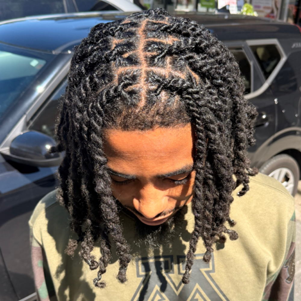 Loc Retwist And 2 Strand Twist at Mane In The Mirror Salon in Charlotte, NC