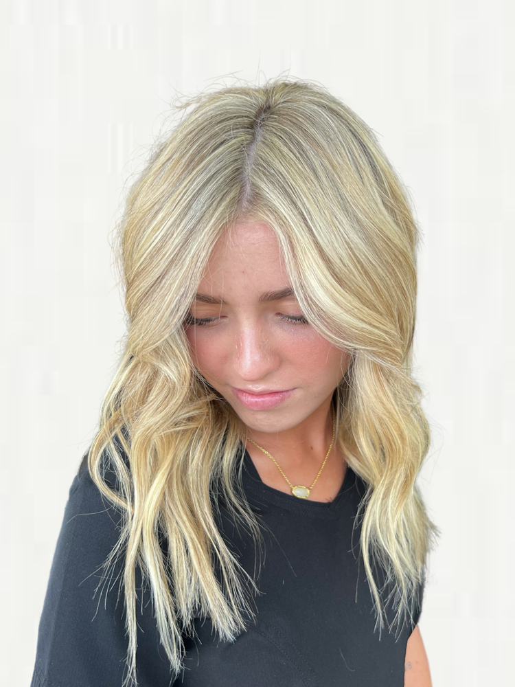 women’s shampoo + blow dry