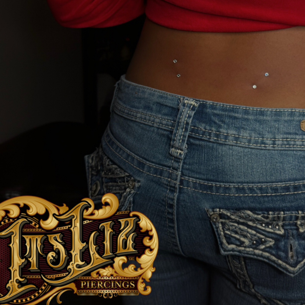 Lower Back Surface (Both) at Itslizpiercings in Houston, TX