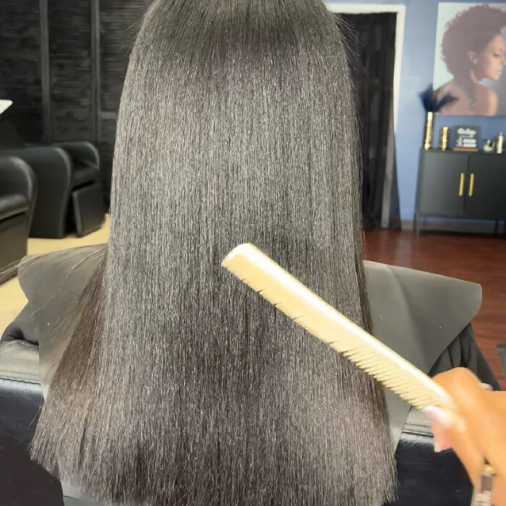 Silk Press Hair Styling at Ebony Chanté in Bridgeton, MO