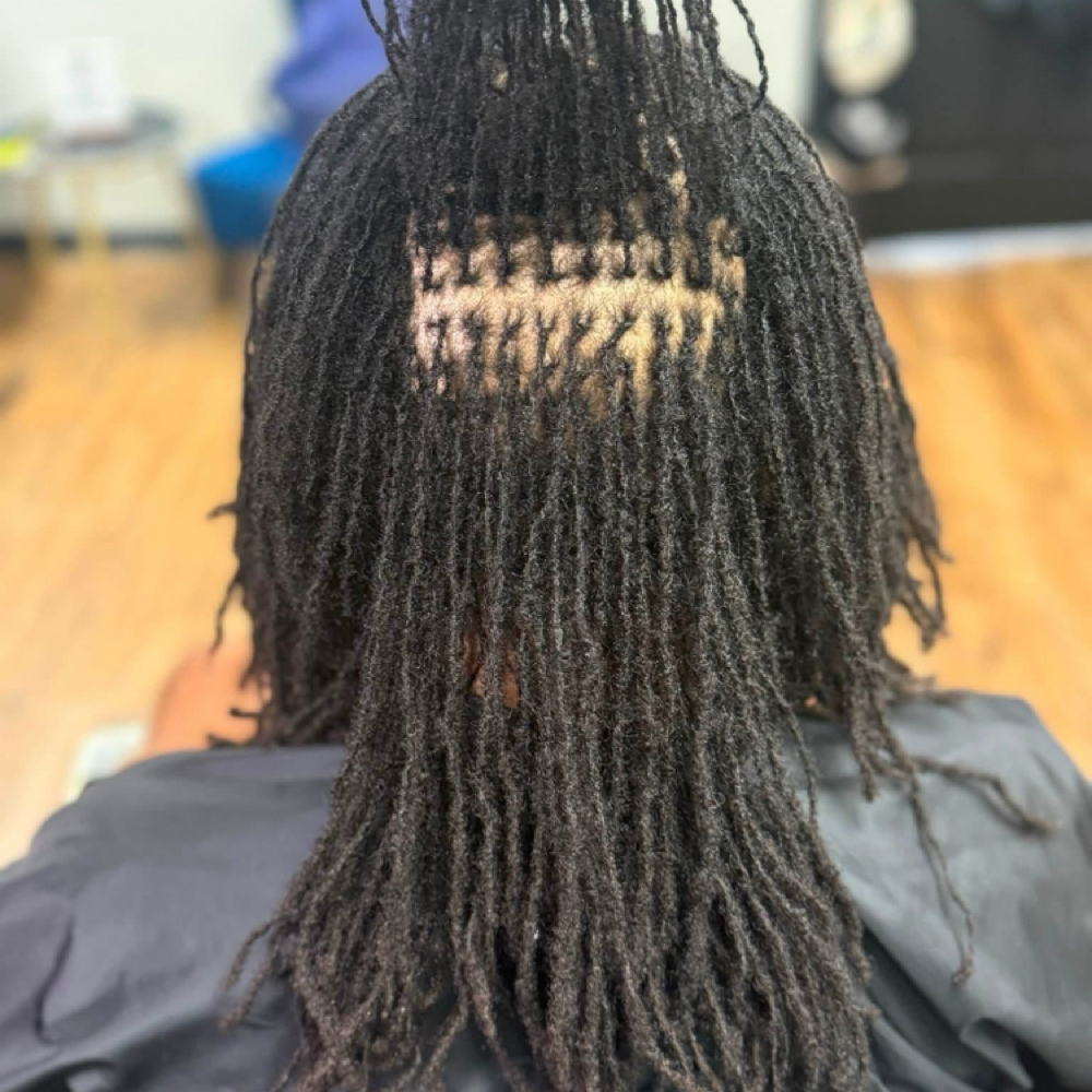 Micro Loc Retie 7-10 Weeks at Elegance Redefined in Belden, MS