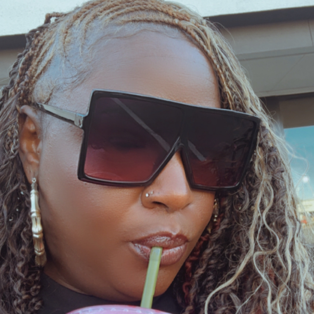 Extension style touch up at Strands Of Life Hair Inc. in Los Angeles, CA