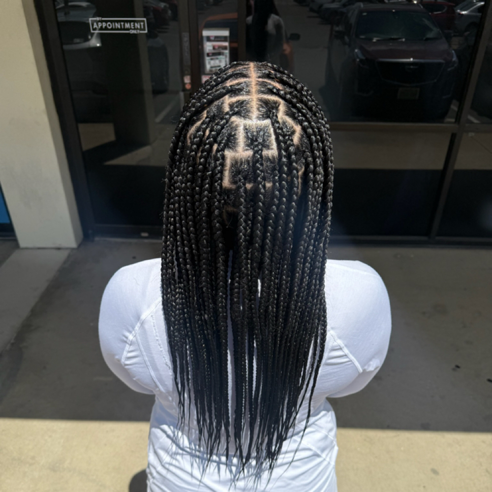 Medium Knotless Braids at Touched By Titi in Round Rock, TX